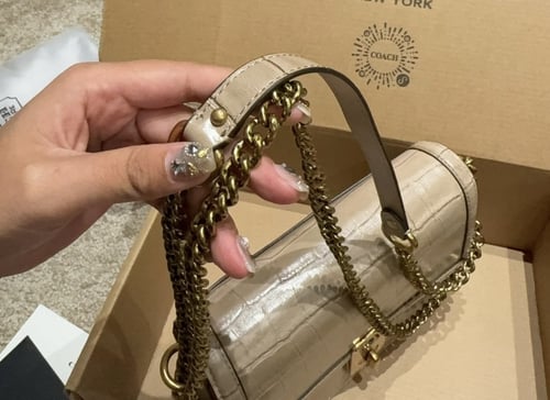 حقيبة كوتش جلد / لونين