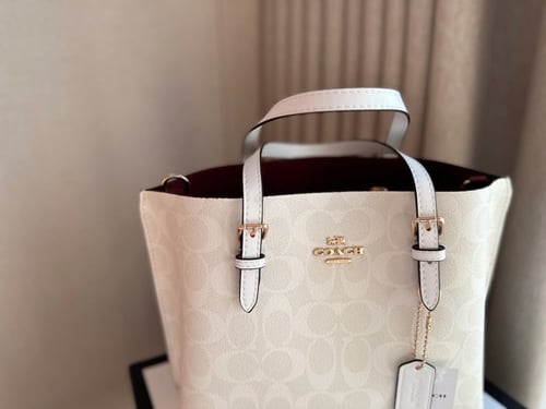 شنطه كوتش ابيض