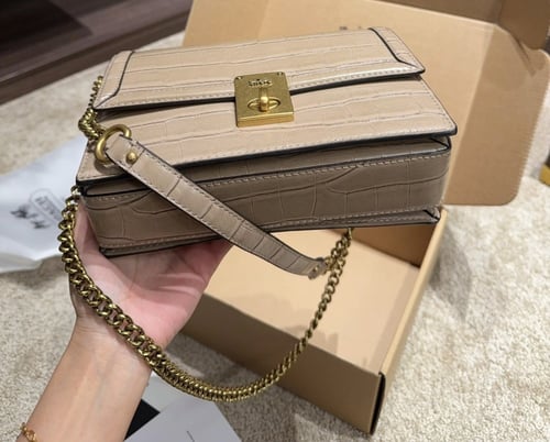 حقيبة كوتش جلد / لونين