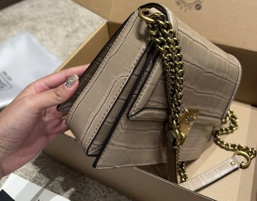 حقيبة كوتش جلد / لونين