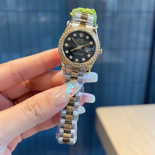 ساعة رولكس ذهبي