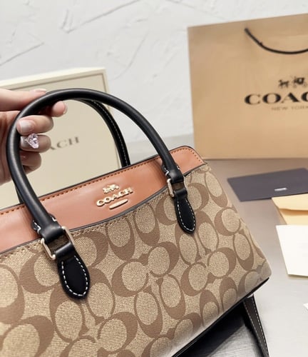 حقيبة كوتش بمقبض ٣ الوان