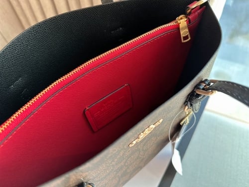 شنطه كوتش بني