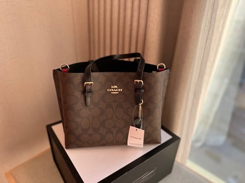 شنطه كوتش بني