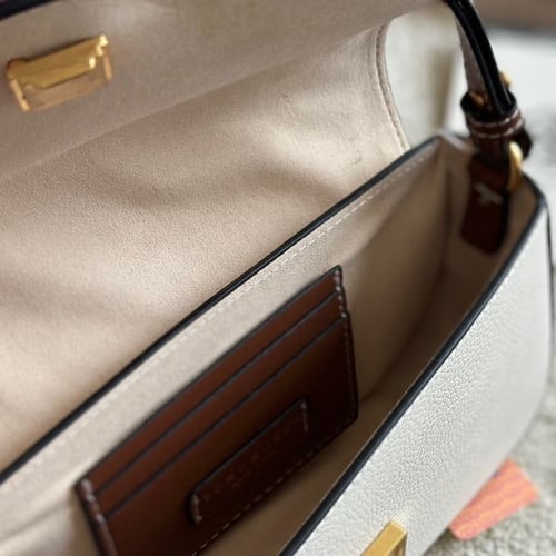 حقيبة توري بورش اسود وبيج