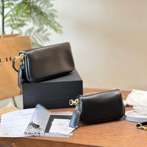 حقيبة كوتش بعدة الوان