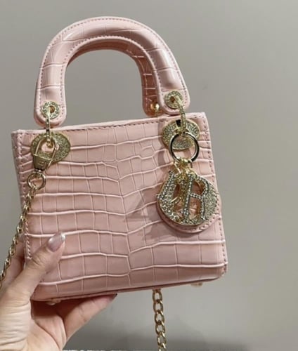 حقيبة dior جلد وردي صغيرة