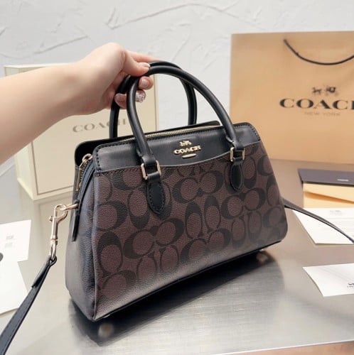 حقيبة كوتش بمقبض ٣ الوان