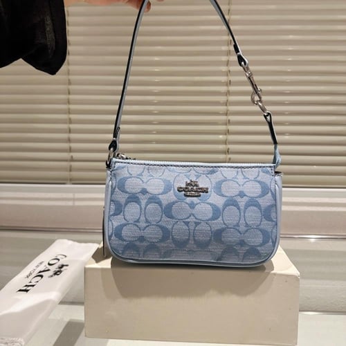 حقيبة كوتش بيج بقلوب