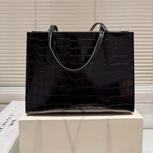 شنطة كوتش اسود / بيج