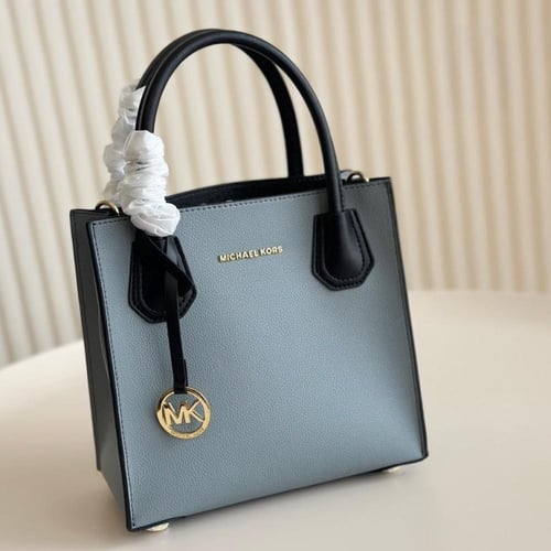 حقيبة مايكل كورس عدة الوان