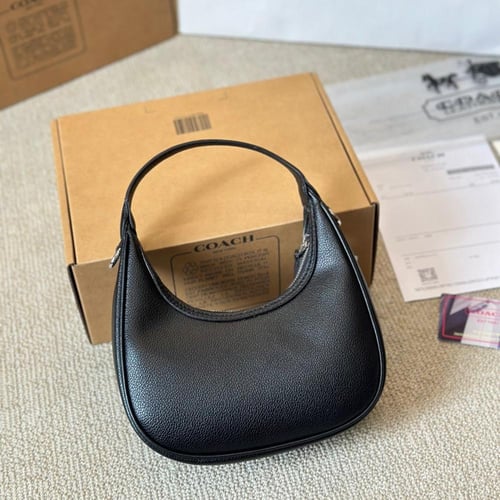 حقيبة كوتش باللون الاسود