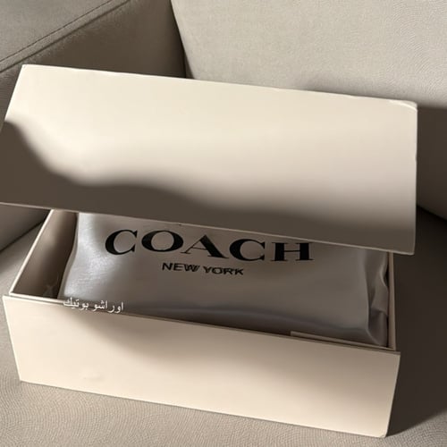 شنطه كوتش كحلي صغيره