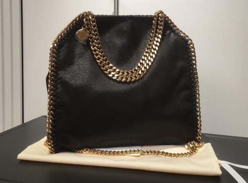 حقيبة ستيلا مكارتني| اسود ذهبي