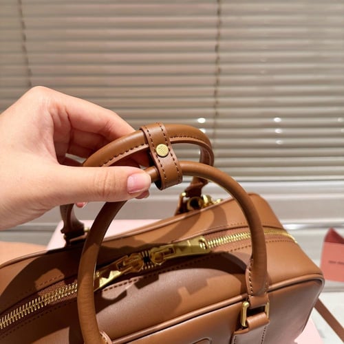 حقيبة ميوميو بعدة الوان