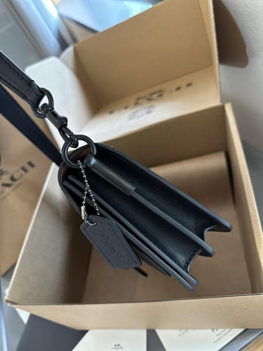 حقيبة كوتش تابي 26 أسود كامل