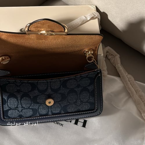 شنطه كوتش كحلي صغيره