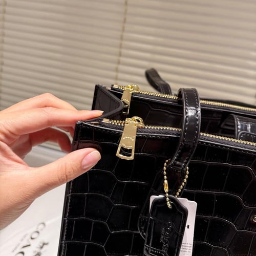 شنطة كوتش اسود / بيج