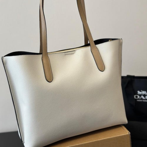 حقيبة كوتش بعدة الوان