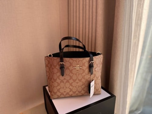 شنطه كوتش بني فاتح