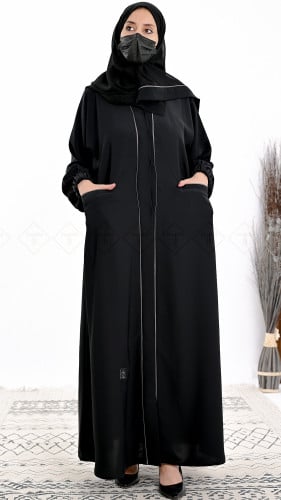 عباية كتف سوداء بجيوب بتحديد فتون