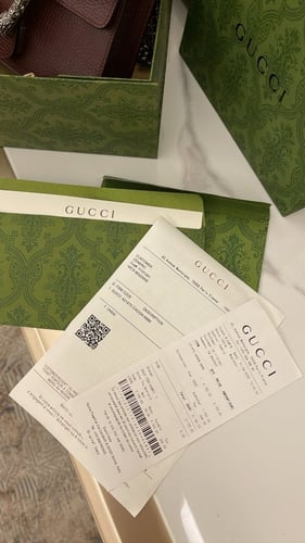 شنطة قوتشي عنابي