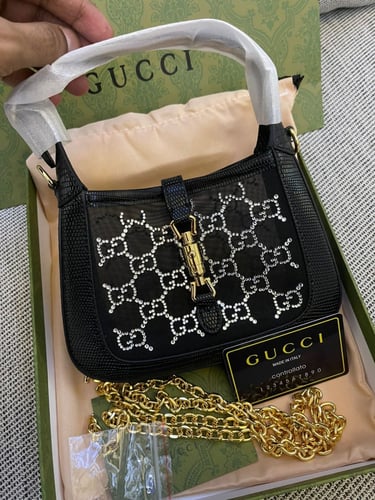 شنطة قوتشي شفاف