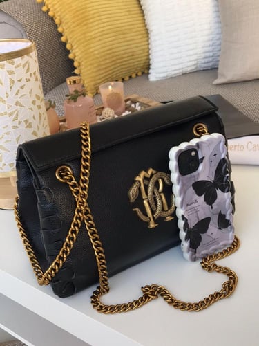 شنط ماركة ربوتو كافالي