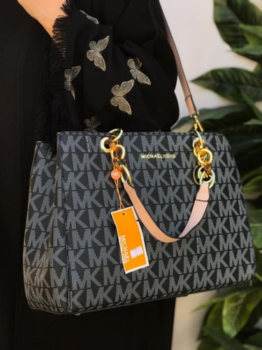 شنط ماركة مايكل كورس