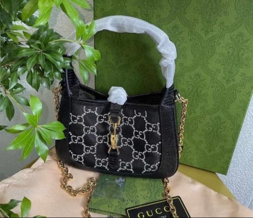 شنطة قوتشي شفاف