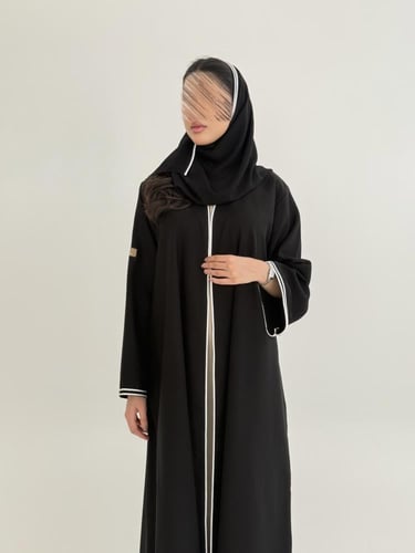 عباية وديم بقماش كريب الاناقة بتحديد قيطان ابيض