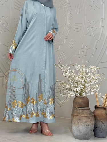 عباية صبا بقماش لنن بارد تطريز ترتر سماوي