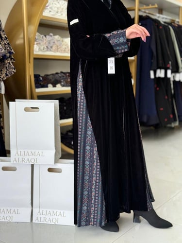 تشكيلة شتاء 2006 - عباية جود كلوش بقماش مخمل تدخيل...