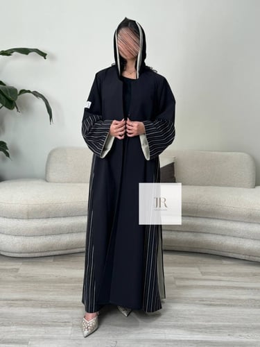 عباية تغريد l بقماش الاناقه تدخيلات كريب مقلم وبيج...