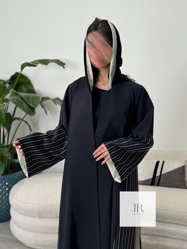 عباية تغريد l بقماش الاناقه تدخيلات كريب مقلم وبيج...