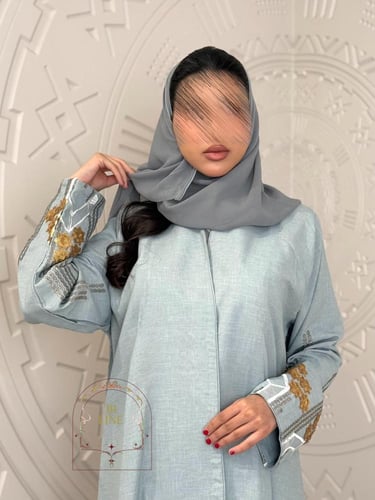 عباية صبا بقماش لنن بارد تطريز ترتر سماوي