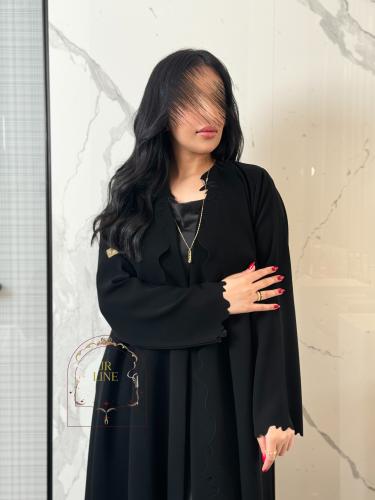 عباية حنان بقماش كريب سرميك بتخريم كمبيوتر اسود