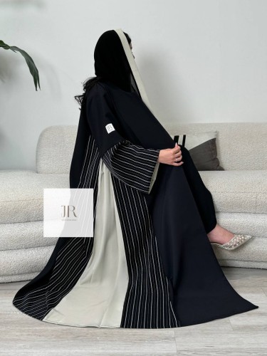 عباية تغريد l بقماش الاناقه تدخيلات كريب مقلم وبيج...