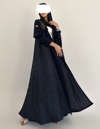 كريب كحلي خفيف مع تفته جاكار بلمعه خفيفة كلوش