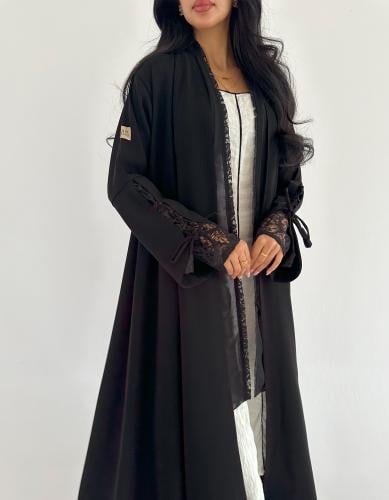 كريب اندونيسي مخطط بالأسود مع دانتيل فرنسي في الأك...