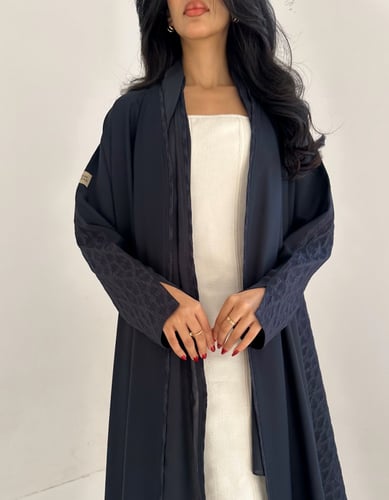 كريب ناعم كحلي مع جاكار من الخلف كلوش