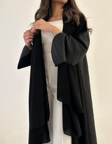 ملكي كلوش وتفته زري لمعة ومخطط من الخلف