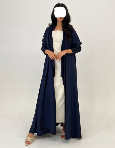 كريب ناعم كحلي مع اطراف جاكار كلوش