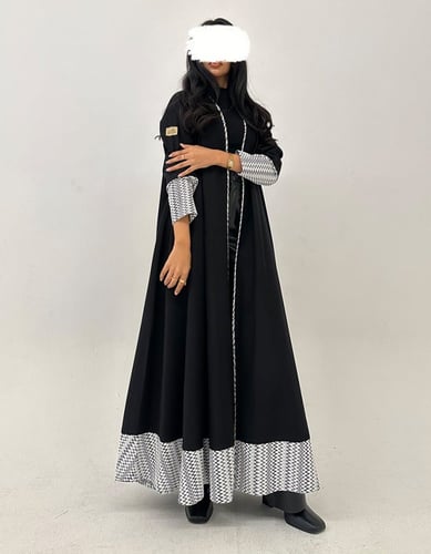 جوخ اسود مع سدو أبيض كلوش