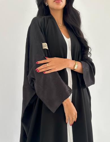 كريب ملكي اسود مع جاكار فاخر ربع بشت اكمام واسعه