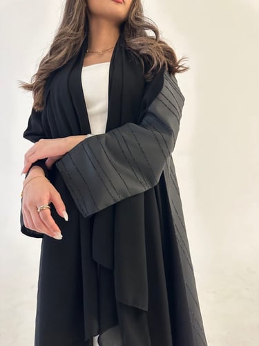 ملكي كلوش وتفته زري لمعة ومخطط من الخلف