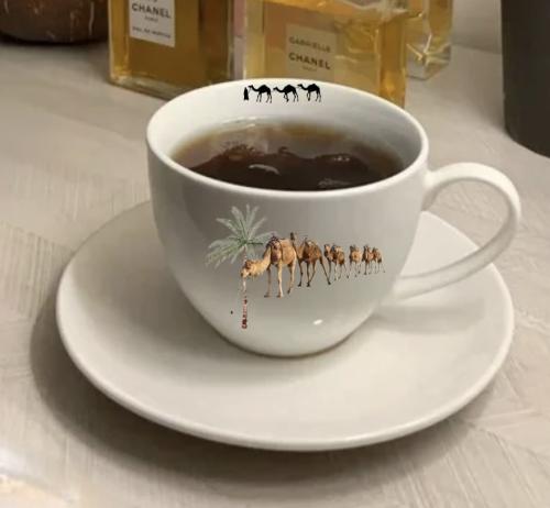 كوب قهوة _جمال ونخله