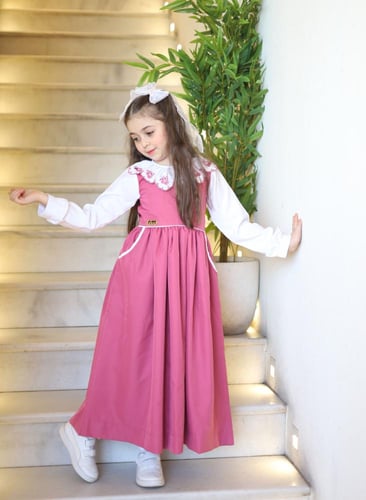 مريول مدرسي للبنات ابتدائي تصميم أنيق بكولة تطريز