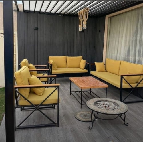 طقم جلسة حديد أسود مع خشب لسبع أشخاص (ضرب)