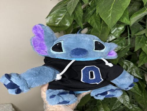 دمية ستيتش وحرف من تحب